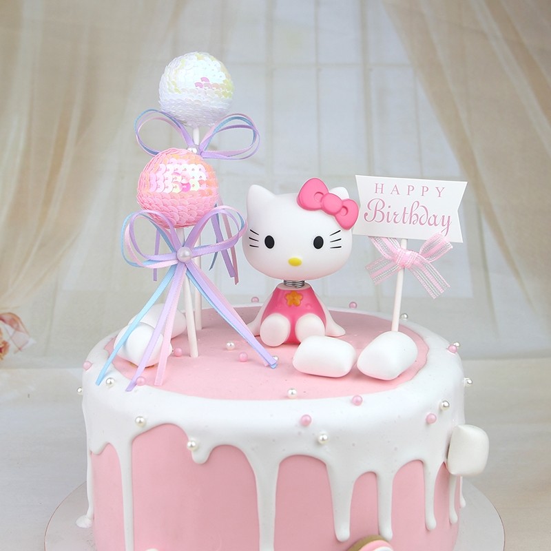 Hello Kitty Shake Head Topper, Shimming balls and Pink Happy Birthday Banner 